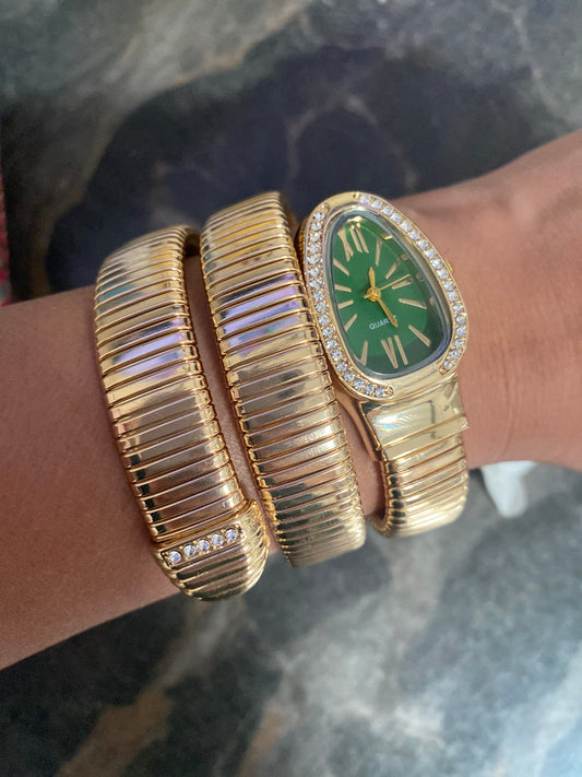Womenâs Gold Tone Bangle Quartz Snake Watch with Green Dial