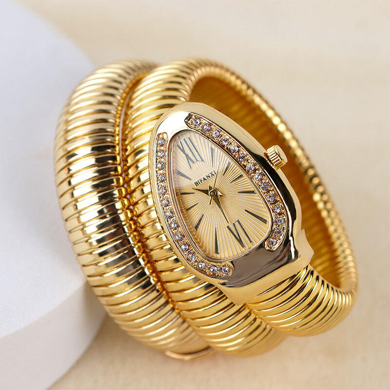 Women’s Gold Tone Bangle Quartz Snake Watch with Green Dial